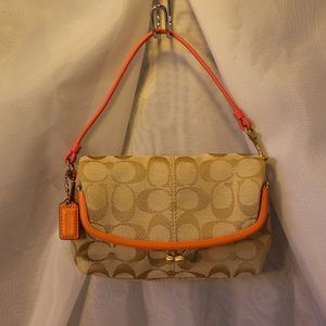 Signature Coach Clutch